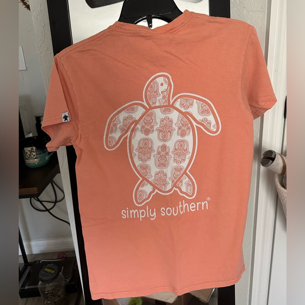 Small, peach colored Simply Southern T-shirt